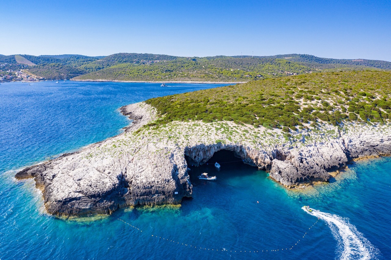 Crystal-clear turquoise water and a hidden cove near Dubrovnik reachable only by boat