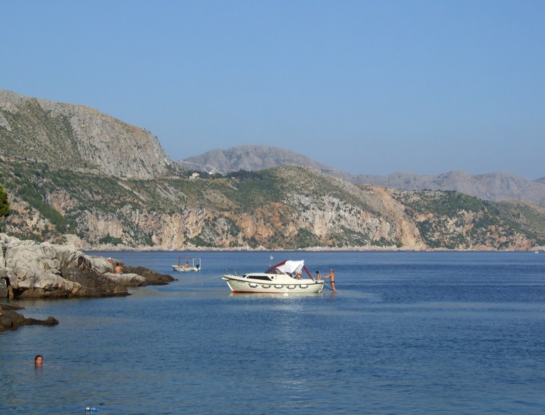 Cabin cruiser with large sun deck moored off Dubrovnik