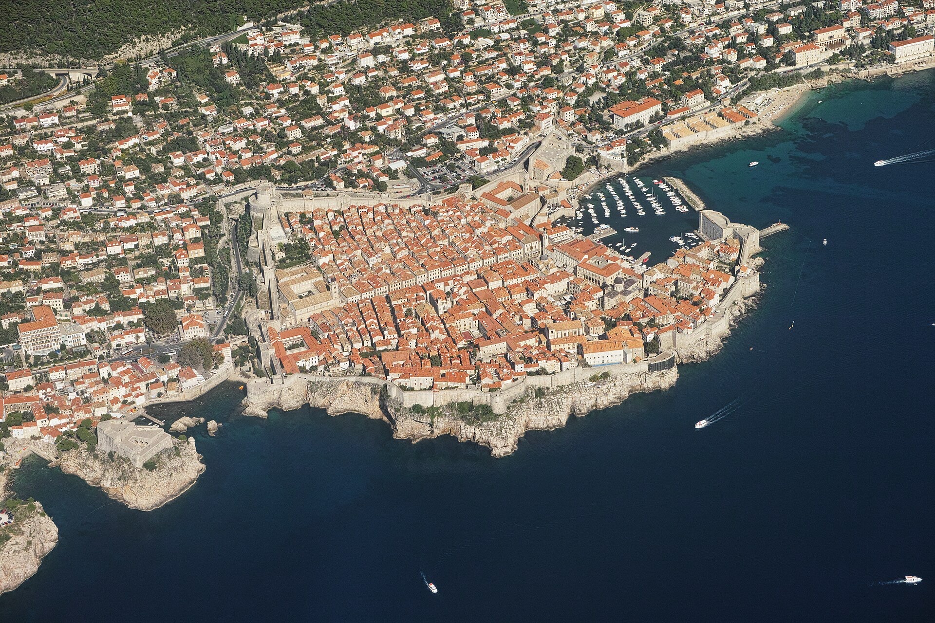 Small group on a speedboat passing Dubrovnik's Old Town walls on the Adriatic